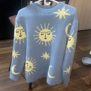 Thick sun and star sweater